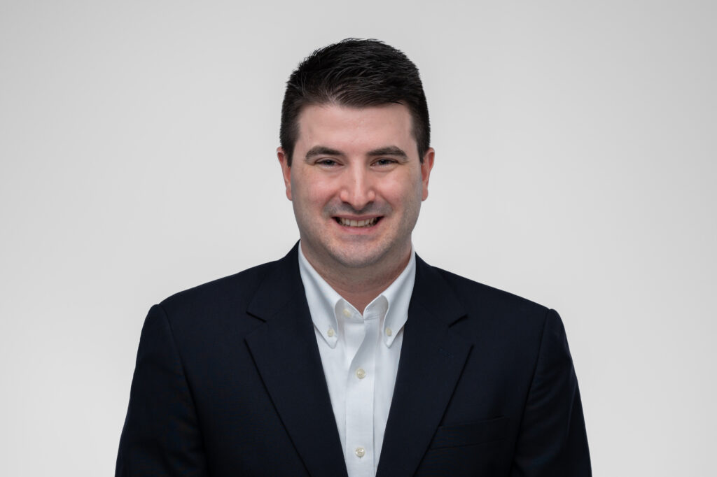 Tyler Hall — General Counsel